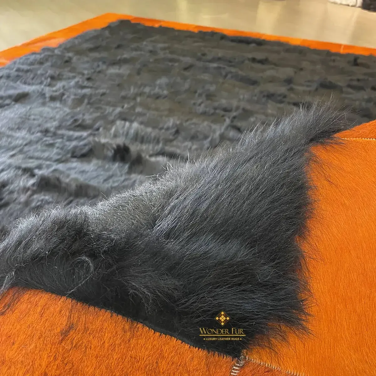 Black Sheepskin with Orange Cowhide Sides Area Rug