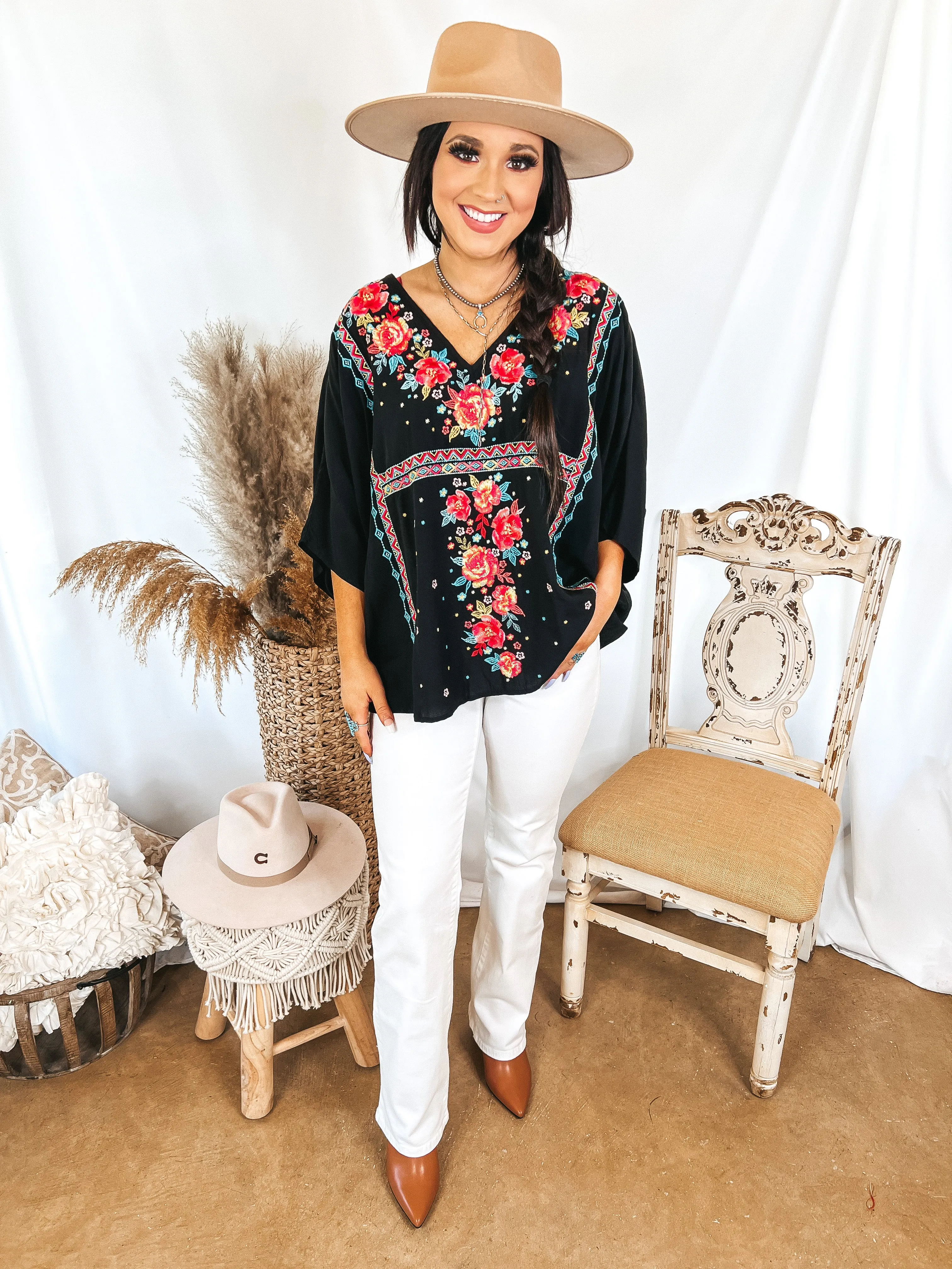 More To The Story Floral Embroidered Poncho Top in Black